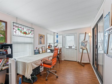 Welcome to this light-filled, tastefully updated gem in Country on El Diablo Executive Golf Course in Florida - for sale on GolfHomes.com, golf home, golf lot