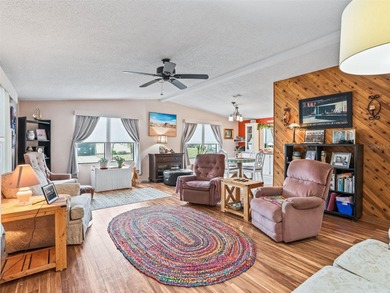 Welcome to this light-filled, tastefully updated gem in Country on El Diablo Executive Golf Course in Florida - for sale on GolfHomes.com, golf home, golf lot