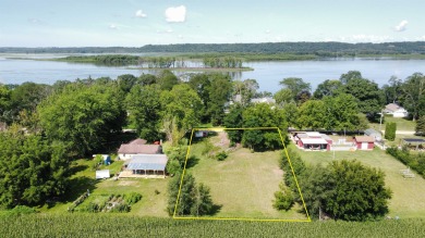 Build your dream house within 500 ft of the Mighty Mississippi on Bucks Barn Golf Resort in Illinois - for sale on GolfHomes.com, golf home, golf lot
