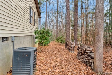Roof replaced in 2024! This 2-bedroom + 1 Flex room home offers on Tanglewood Shores Golf Club in Virginia - for sale on GolfHomes.com, golf home, golf lot