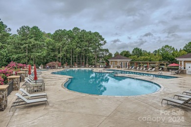 Discover bliss at the highly sought-after Sun City Carolina on Carolina Lakes Golf Club, LLC in South Carolina - for sale on GolfHomes.com, golf home, golf lot