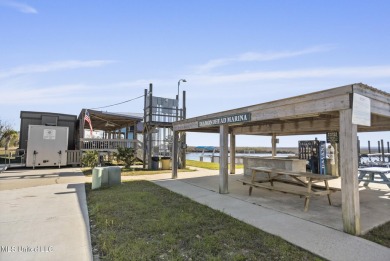 Beautiful waterfront lot with deep water access located just on Diamondhead Country Club in Mississippi - for sale on GolfHomes.com, golf home, golf lot