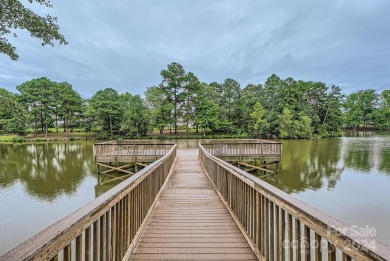 Discover bliss at the highly sought-after Sun City Carolina on Carolina Lakes Golf Club, LLC in South Carolina - for sale on GolfHomes.com, golf home, golf lot