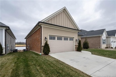 WELCOME TO CHAMPIONS POINTE & this stunning, LIKE-NEW home on Champions Pointe Golf Course in Indiana - for sale on GolfHomes.com, golf home, golf lot