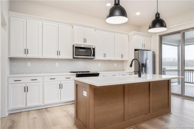 WELCOME TO CHAMPIONS POINTE & this stunning, LIKE-NEW home on Champions Pointe Golf Course in Indiana - for sale on GolfHomes.com, golf home, golf lot