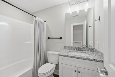 Recently built in 2024, this like new home is close to the North on The Highlands Course at Lake Arrowhead in Georgia - for sale on GolfHomes.com, golf home, golf lot