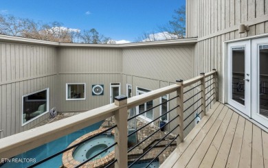 This contemporary home offers a relaxed outdoor living area on Fox Den Country Club in Tennessee - for sale on GolfHomes.com, golf home, golf lot