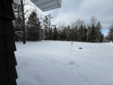 Exceptional Build-Ready Opportunity in Lost Lake Woods Club.
 on Lost Lake Woods Club in Michigan - for sale on GolfHomes.com, golf home, golf lot