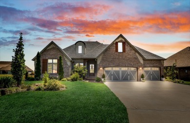 This stunning all-brick and stone home in the prestigious on Rivercut Golf Course in Missouri - for sale on GolfHomes.com, golf home, golf lot