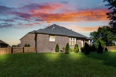 This stunning all-brick and stone home in the prestigious on Rivercut Golf Course in Missouri - for sale on GolfHomes.com, golf home, golf lot