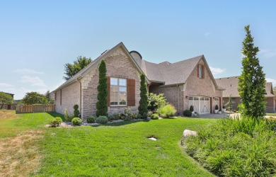 This stunning all-brick and stone home in the prestigious on Rivercut Golf Course in Missouri - for sale on GolfHomes.com, golf home, golf lot