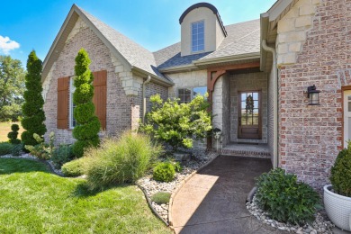 This stunning all-brick and stone home in the prestigious on Rivercut Golf Course in Missouri - for sale on GolfHomes.com, golf home, golf lot