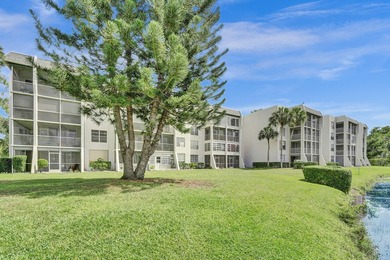 Experience resort-style living in this spacious 2-bedroom on  in Florida - for sale on GolfHomes.com, golf home, golf lot
