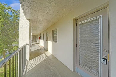 Experience resort-style living in this spacious 2-bedroom on  in Florida - for sale on GolfHomes.com, golf home, golf lot