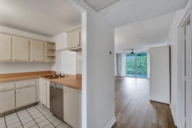 Experience resort-style living in this spacious 2-bedroom on  in Florida - for sale on GolfHomes.com, golf home, golf lot