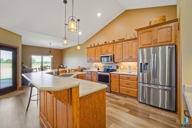 This custom-built 3-bedroom, 2-bath home backs to the 5th hole on The Bridges At Beresford in South Dakota - for sale on GolfHomes.com, golf home, golf lot