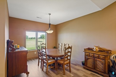 This custom-built 3-bedroom, 2-bath home backs to the 5th hole on The Bridges At Beresford in South Dakota - for sale on GolfHomes.com, golf home, golf lot