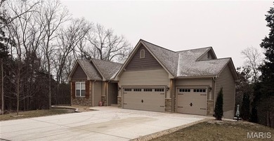 Beautiful custom built 3 bedroom, 2 bath home offers over 2500 on Raintree Country Club in Missouri - for sale on GolfHomes.com, golf home, golf lot