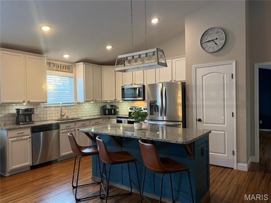 Beautiful custom built 3 bedroom, 2 bath home offers over 2500 on Raintree Country Club in Missouri - for sale on GolfHomes.com, golf home, golf lot