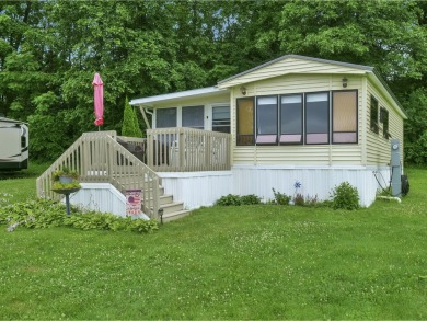 Discover the charm of this sweet, fully-furnished 1-bedroom and on Apple Island Golf Course At Apple Island Resort in Vermont - for sale on GolfHomes.com, golf home, golf lot