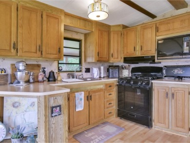 Discover the charm of this sweet, fully-furnished 1-bedroom and on Apple Island Golf Course At Apple Island Resort in Vermont - for sale on GolfHomes.com, golf home, golf lot