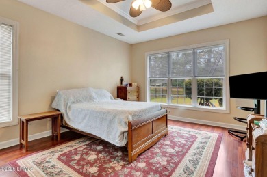This 3-bedroom home with an office and a sunroom offers a split on Eagles Pointe Golf Club in South Carolina - for sale on GolfHomes.com, golf home, golf lot