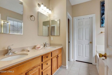 This 3-bedroom home with an office and a sunroom offers a split on Eagles Pointe Golf Club in South Carolina - for sale on GolfHomes.com, golf home, golf lot
