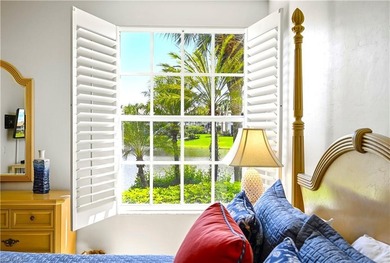 STUNNING FIRST FLOOR UNIT, WITH LONG LAKE VIEWS in Harbor on Bonita Bay West in Florida - for sale on GolfHomes.com, golf home, golf lot