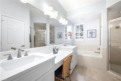 STUNNING FIRST FLOOR UNIT, WITH LONG LAKE VIEWS in Harbor on Bonita Bay West in Florida - for sale on GolfHomes.com, golf home, golf lot