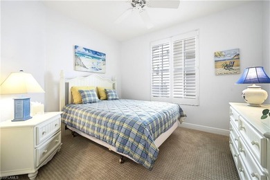 STUNNING FIRST FLOOR UNIT, WITH LONG LAKE VIEWS in Harbor on Bonita Bay West in Florida - for sale on GolfHomes.com, golf home, golf lot