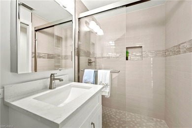 STUNNING FIRST FLOOR UNIT, WITH LONG LAKE VIEWS in Harbor on Bonita Bay West in Florida - for sale on GolfHomes.com, golf home, golf lot