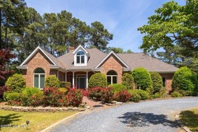 This gorgeous brick home in desirable Pinewild CC is situated on on Pinewild Country Club of Pinehurst in North Carolina - for sale on GolfHomes.com, golf home, golf lot