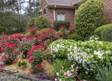 This gorgeous brick home in desirable Pinewild CC is situated on on Pinewild Country Club of Pinehurst in North Carolina - for sale on GolfHomes.com, golf home, golf lot