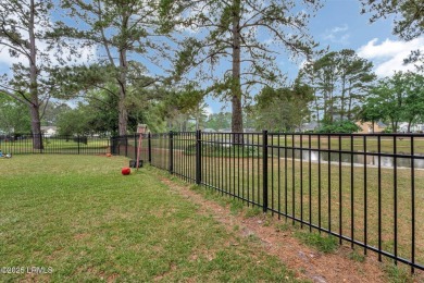 This 3-bedroom home with an office and a sunroom offers a split on Eagles Pointe Golf Club in South Carolina - for sale on GolfHomes.com, golf home, golf lot
