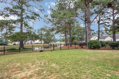This 3-bedroom home with an office and a sunroom offers a split on Eagles Pointe Golf Club in South Carolina - for sale on GolfHomes.com, golf home, golf lot