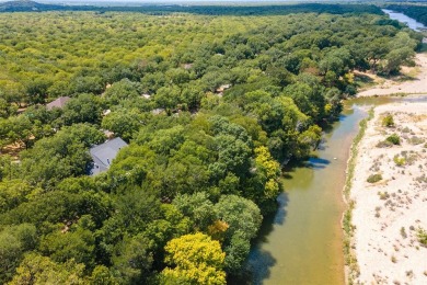 SPACIOUS RIVERFRONT PROPERTY ON DOUBLE LOT (with one assessment) on Nutcracker Golf Club in Texas - for sale on GolfHomes.com, golf home, golf lot