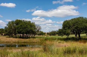 Beautiful single family corner lot overlooking the green of hole on The Club At Comanche Trace in Texas - for sale on GolfHomes.com, golf home, golf lot