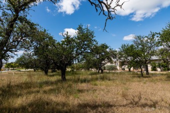 Beautiful single family corner lot overlooking the green of hole on The Club At Comanche Trace in Texas - for sale on GolfHomes.com, golf home, golf lot