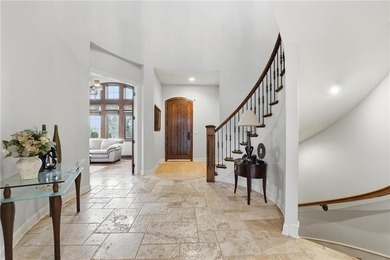 Experience luxury living in this stunning 1.5-story home on The Deuce At the National Golf Club of Kansas City in Missouri - for sale on GolfHomes.com, golf home, golf lot