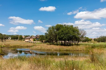 Beautiful single family corner lot overlooking the green of hole on The Club At Comanche Trace in Texas - for sale on GolfHomes.com, golf home, golf lot