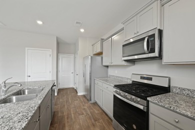 Welcome to this beautifully maintained 4-bedroom, 2.5-bath home on Cypress Point Par 3 in South Carolina - for sale on GolfHomes.com, golf home, golf lot