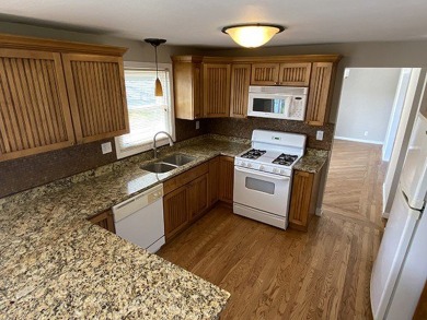 Simply stunning is this breathtaking four-bedroom, two and a on Chapel Hill Country Club in Illinois - for sale on GolfHomes.com, golf home, golf lot