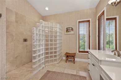 This elevated island residence offers refined tropical living in on Beachview Golf Club in Florida - for sale on GolfHomes.com, golf home, golf lot