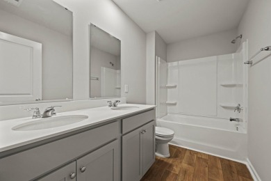 Welcome to this beautifully maintained 4-bedroom, 2.5-bath home on Cypress Point Par 3 in South Carolina - for sale on GolfHomes.com, golf home, golf lot