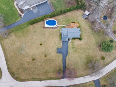 Simply stunning is this breathtaking four-bedroom, two and a on Chapel Hill Country Club in Illinois - for sale on GolfHomes.com, golf home, golf lot