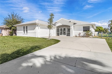 This stunning 4-bedroom, 2.5-bath waterfront pool home is on Burnt Store Golf Club in Florida - for sale on GolfHomes.com, golf home, golf lot