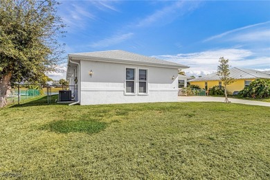 This stunning 4-bedroom, 2.5-bath waterfront pool home is on Burnt Store Golf Club in Florida - for sale on GolfHomes.com, golf home, golf lot