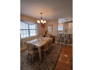 Check out this beautifully updated 2-bedroom, 2-bath home in the on Heron Point Golf Club in South Carolina - for sale on GolfHomes.com, golf home, golf lot