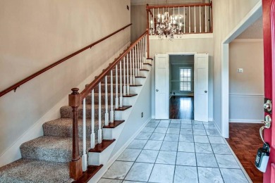 Nestled on the Colonial Country Club golf course, this amazing on Colonial Country Club in Tennessee - for sale on GolfHomes.com, golf home, golf lot