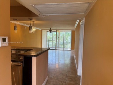 2/2 well-kept unit w/ screened-in patio & water view. Marble on Pine Island Ridge Country Club in Florida - for sale on GolfHomes.com, golf home, golf lot
